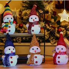 Svietiaci vianočný snehuliak